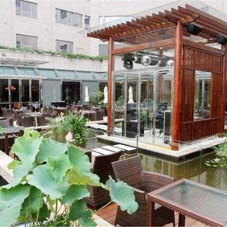 Zhongshan Lighting Era Hotel Bagian luar foto