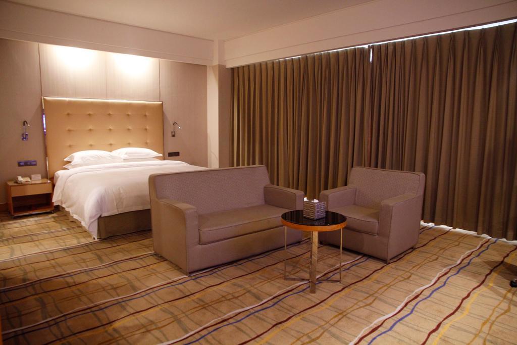 Zhongshan Lighting Era Hotel Bagian luar foto
